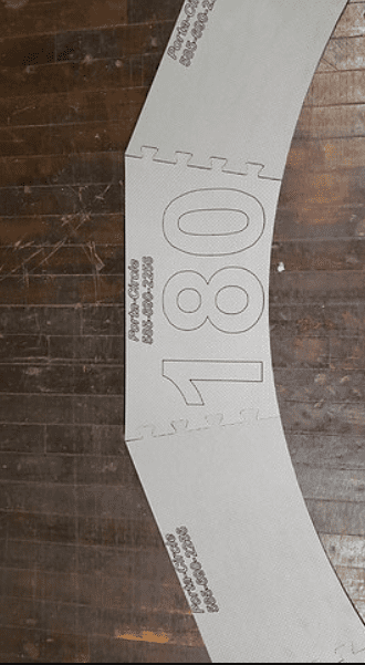 Curved floor mat section